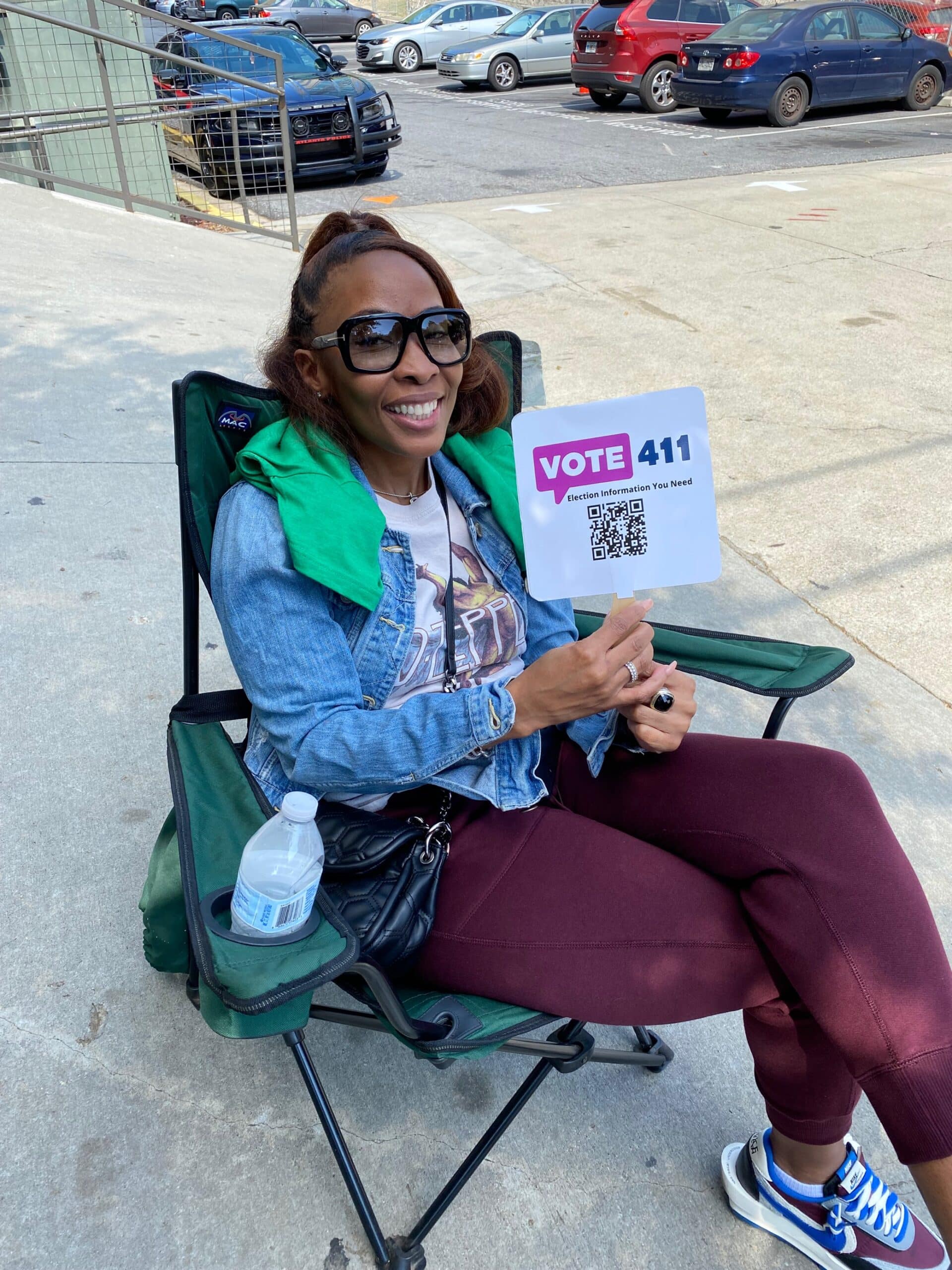 Supporter holding a VOTE411 sign